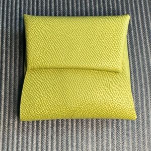 Green leather coin wallet.
